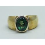 A silver gilt and green diopside solitaire ring, O