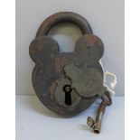 A vintage padlock with key