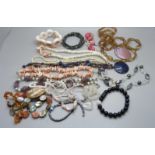 Gemstone jewellery including amber, smokey quartz, coral, etc.
