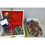 A jewellery case and a box of costume jewellery