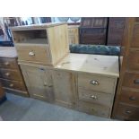 A pine kitchen cabinet and a table