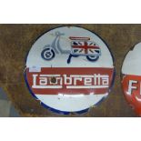 A circular enamelled Lambretta sign