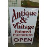 A double sided Antique & Vintage Furniture shop sign