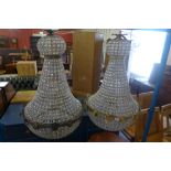 A pair of similar French Empire style bag shaped chandeliers