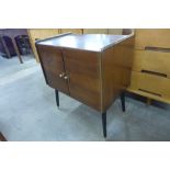 A walnut record cabinet