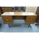 An Austin Suite teak desk