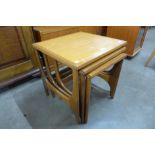 A Stonehill Stateroom teak nest of tables