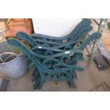 Three pairs of painted cast iron bench ends