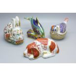 Four Royal Crown Derby paperweights; Puppy, Meadow Rabbit, Baby Bottlenose Dolphin and a bird