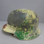A German helmet shell relic, size 64, post war paint