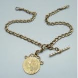 A gold plated Albert chain with replica coin fob