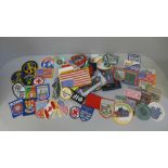 A collection of cloth badges