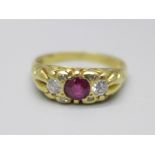 An 18ct gold, ruby and diamond ring, 5g, O
