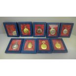 Nine pendant watches, in boxes