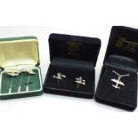 A pair of silver Spitfire cufflinks, three silver RAF stick pins and a silver plane pendant