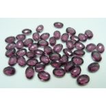 A collection of unmounted loose amethysts, 14mm x 10mm, 47.2g