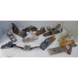 A collection of woodworking planes including Norris