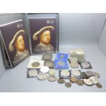 A collection of commemorative crowns and other coins