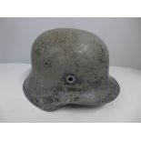 A German WWII SE64 helmet shell, EF64, lot 338
