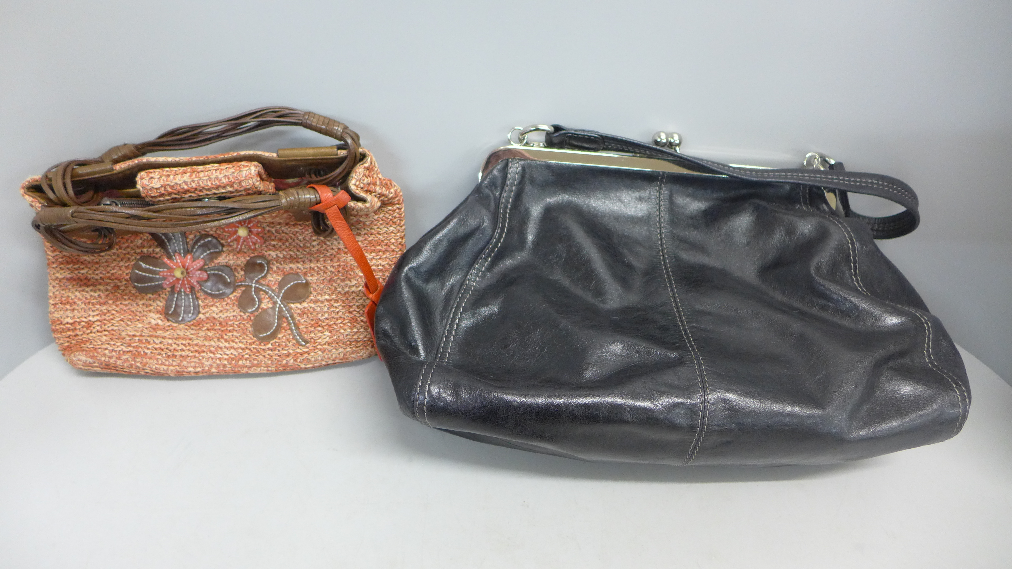 Two Tula handbags