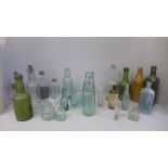 A collection of glass bottles, medical, etc.