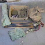 Vintage Army items including bed and brass shells
