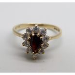 A 9ct gold, red and white stone ring, 1.6g, I
