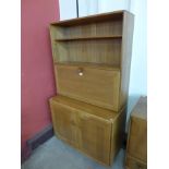 An Ercol Blonde elm Windsor writing cabinet/bookcase