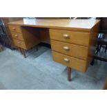 An Austin Suite teak desk