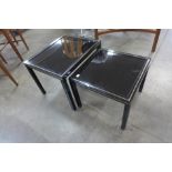 A Pierre Vandel of Paris black lacquered metal and glass topped nest of two tables