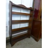 An early 20th Century oak open bookcase