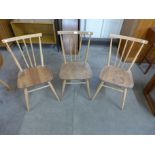 A set of three Ercol elm and beech 608 model chairs