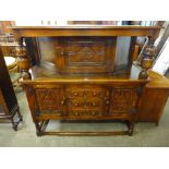 A 17th Century style carved oak court cupboard