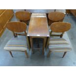 A teak drop-leaf table and four chairs