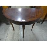 A Regency style mahogany demi lune hall table