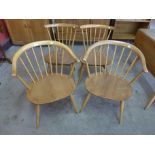 A pair of Ercol Blonde elm and beech 449A model cow horn chairs and another pair of Ercol chairs