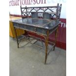 A Victorian Aesthetic Movement style bamboo and black lacquered chinoiserie desk