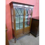 An Edward VII inlaid mahogany two door side cabinet