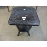 A small Arts and Crafts Liberty & Co. ebonised occasional table