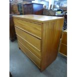 A teak chest of drawers