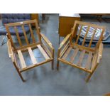 A pair of Centa teak cocktail lounge chairs