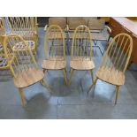 A set of four Ercol elm and beech Quaker chairs