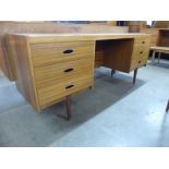 An Austin Suite teak desk