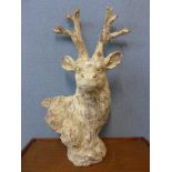 A terracotta bust of a stag