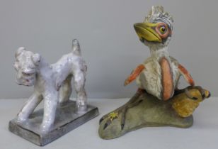 A German pottery figure of a terrier and a Boehm Blue Heron chick with insect