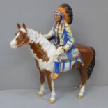 A Beswick 'Red Indian' on horseback, gloss finish, model 1391, one leg restored