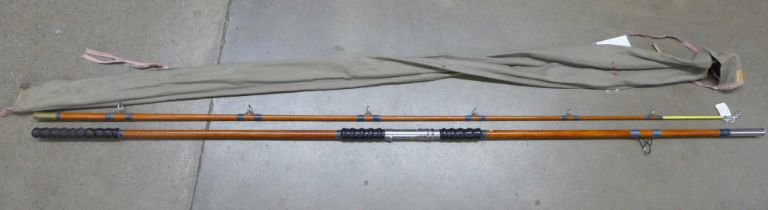 A 12ft two piece fibreglass beach/surf casting rod, made in England by Rodrill, London in the 1960s,