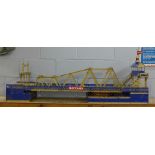 A Meccano motorised swing bridge, constructed from 1930s parts, 1.5m long **PLEASE NOTE THIS LOT