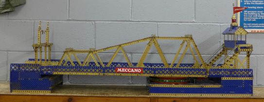 A Meccano motorised swing bridge, constructed from 1930s parts, 1.5m long **PLEASE NOTE THIS LOT