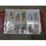 Cigarette cards:- album of cigarette and trade cards of birds, 10 sets including Players, 'Aviary